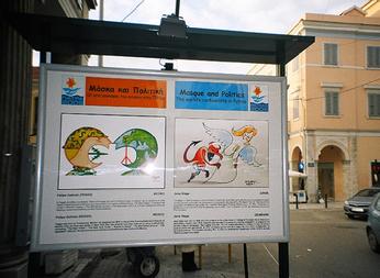 Political Cartoon, public banners, Patras, Greece.